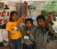 kids_on_mic_and_fists_s.jpg